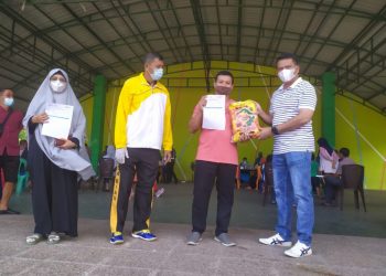 Kapolres Inhu Tinjau Vaksinasi Covid-19 Massal dan Bagikan Sembako di RTH Rengat