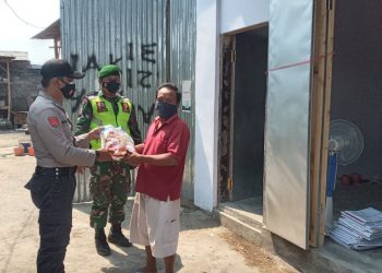 Polres Pasuruan Kota Salurkan Bansos Beras Kepada Masyarakat Yang Terdampak Covid-19